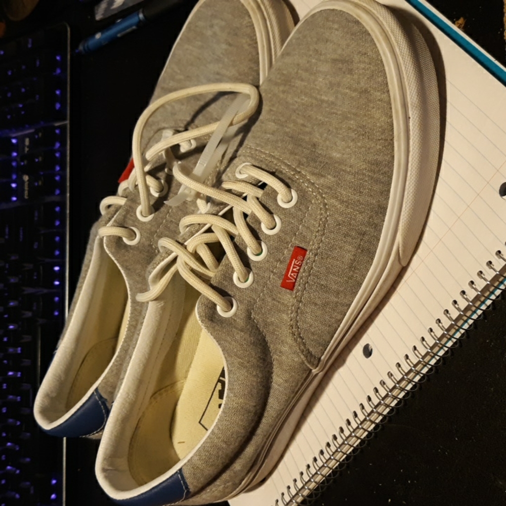 Gray Vans with green and blue accents
